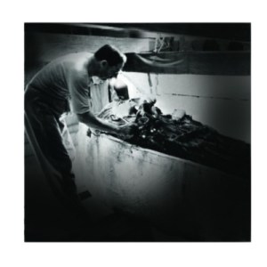 Mr. Carter analyzing the funerary coffin of Tutankhamon